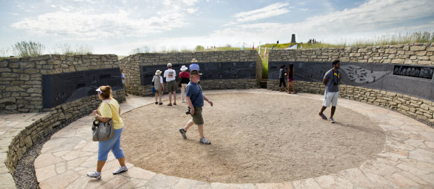 Visitors tour the Indian Memorial at the Little Bighorn National